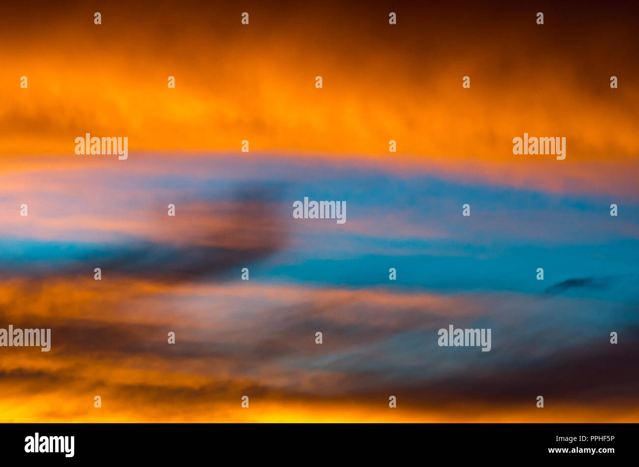 Background texture of dramatic sunset sky with orange clouds after ...