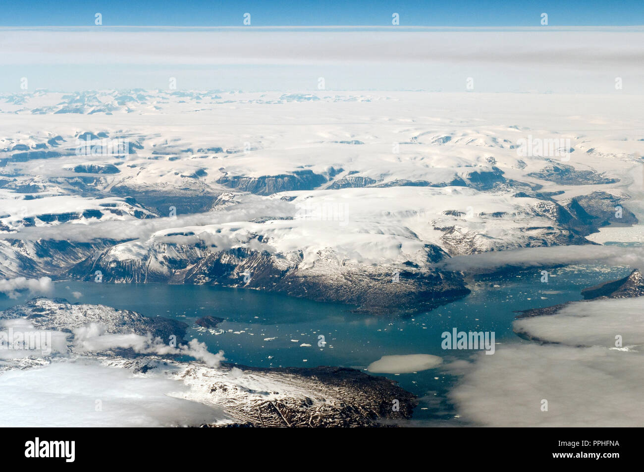 Aerial view of Greenland and it's terrain including glaciers, waterways, ice and snow Stock Photo