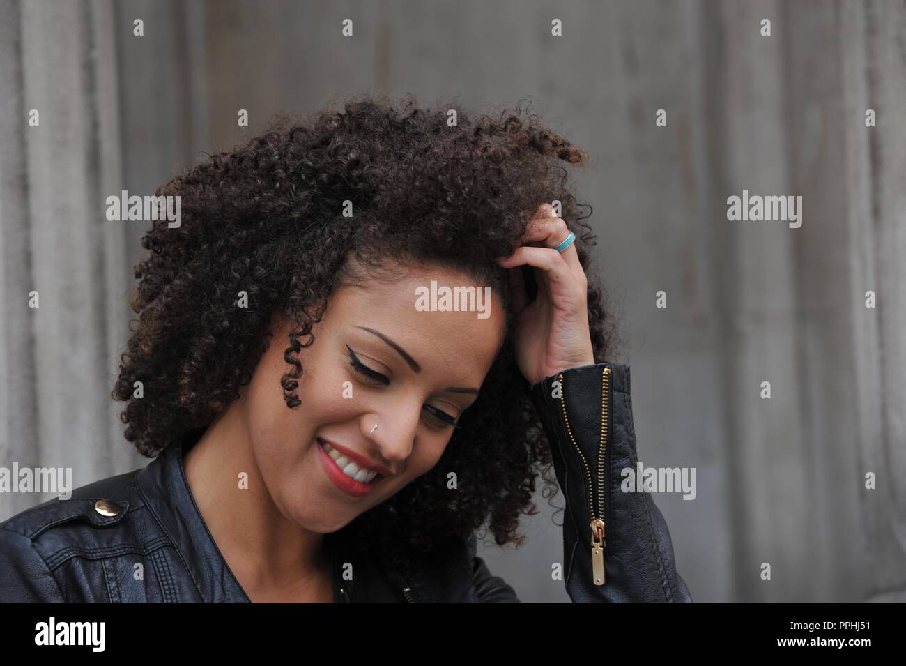 Beautiful Mixed Race Model Relaxing Outside Stock Photo 220434285