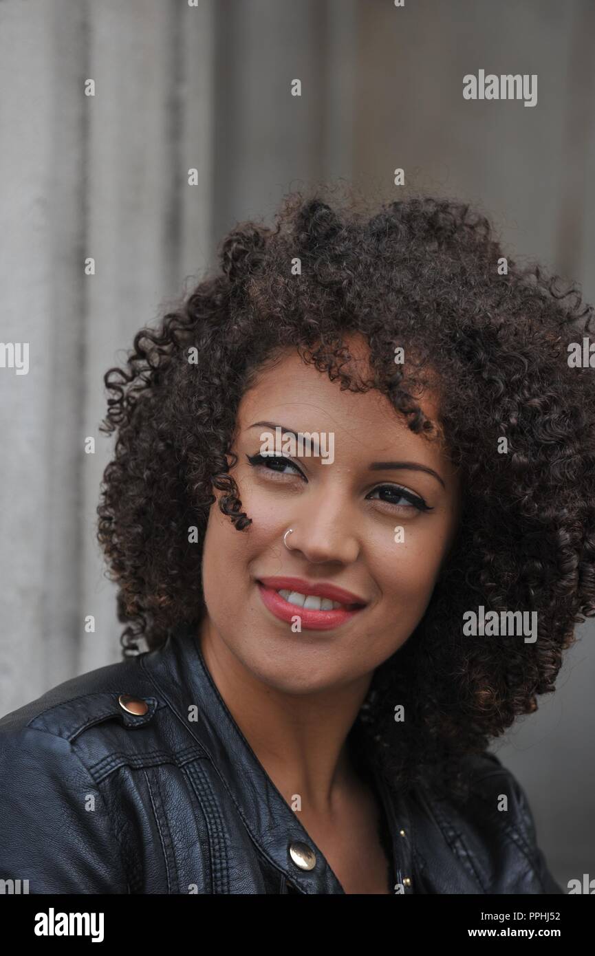 Beautiful Mixed Race Model Relaxing Outside Stock Photo 220434286
