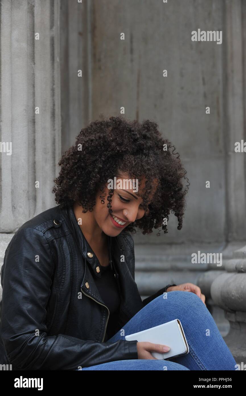 Beautiful Mixed Race Model Relaxing Outside Stock Photo 220434290
