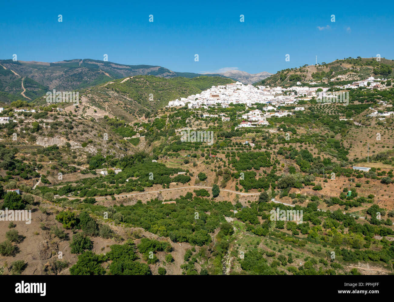 White houses of mountain village, Canillas de Albaida, Mudejar route in Sierras de Tejeda Natural park, Axarquia, Andalusia, Spain Stock Photo
