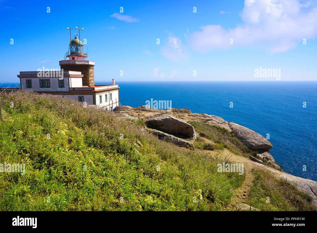 Finisterre lighthouse Fisterra at the end of Saint James way in Galicia  Spain Stock Photo - Alamy