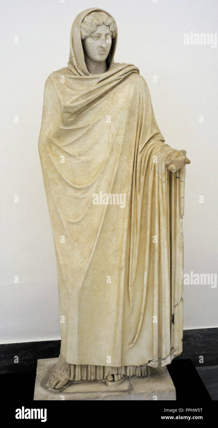 Aphrodite Sosandra. White Paros marble. From Baia, copy made in the Hadrian period of a Greek original of the 5th century BC. by Kalamis. National Archaeological Museum, Naples. Italy. Stock Photo