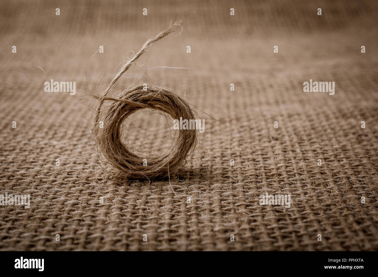 Paper String Background Roll of brown color linen string paper background Stock Photo - Alamy