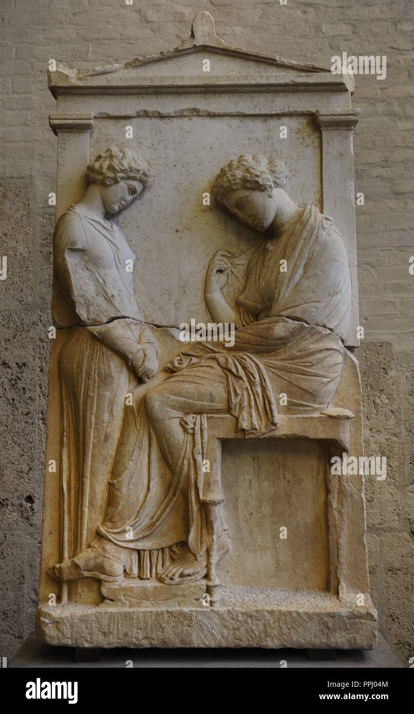 Greek art. Grave relief of Mnesarete. About 380 BC. The dead woman is seated in front of a sorrowing girl. The name is recorded on the pediment Mnesarete (daughter) of Socrates. Glyptothek. Munich. Stock Photo