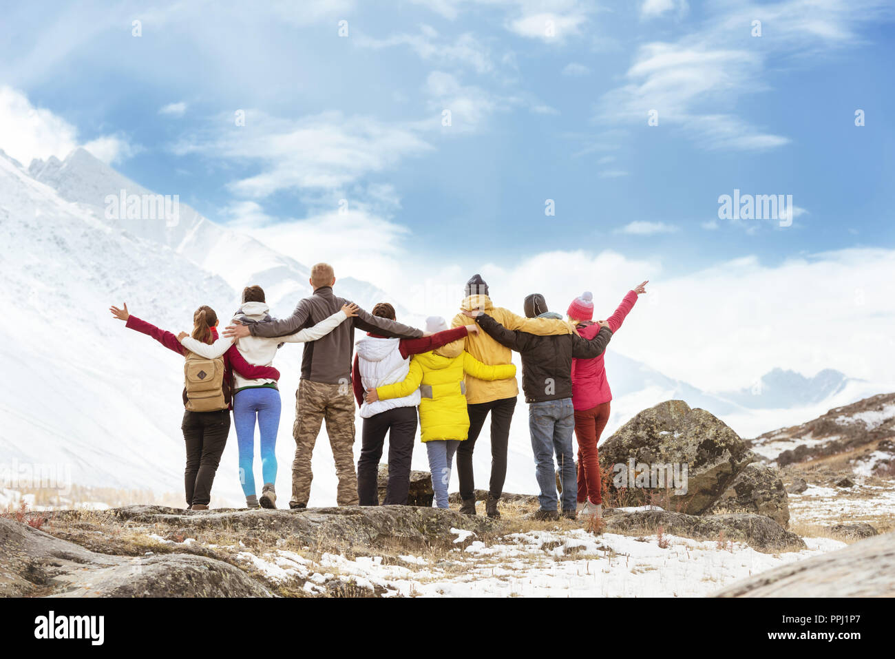 Big group happy friends mountains travel Stock Photo