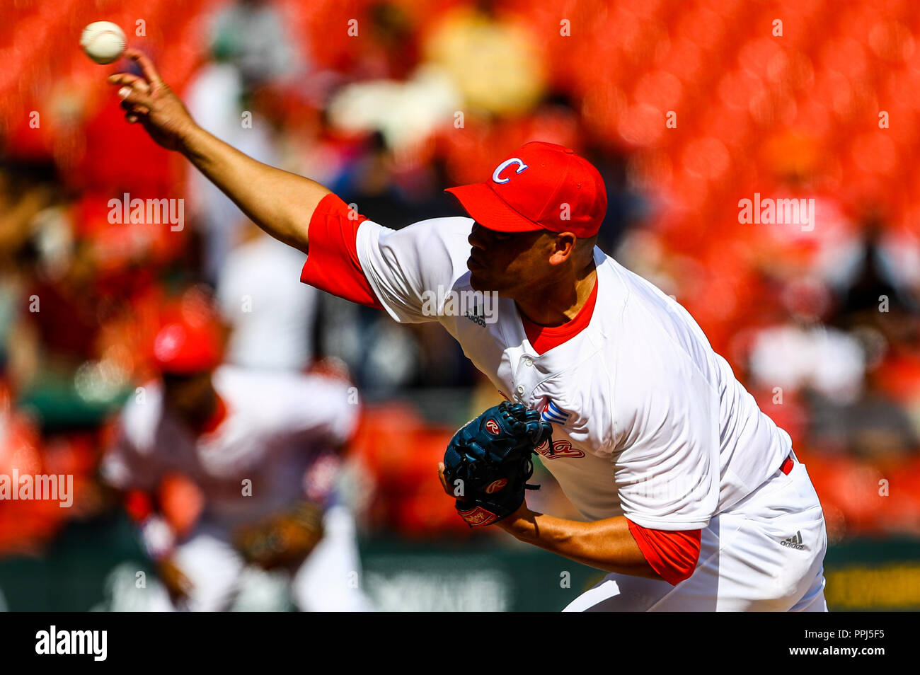 Lazaro Blanco, starting pitcher of the Alazanes of Granma Cuba, throws the ball in the first inning of the baseball game of the Caribbean Series again Stock Photo