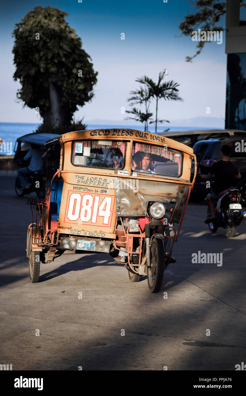 Auto rickshaw tricycle taxi in Dumaguete, Philippines Stock Photo - Alamy