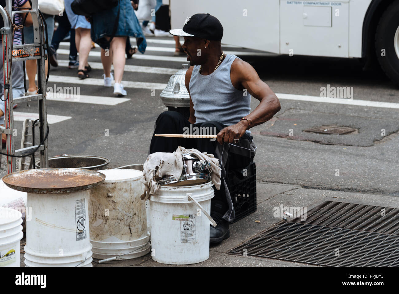 New York City, USA - June 22, 2018: Black man playing drums in New York city street Stock Photo
