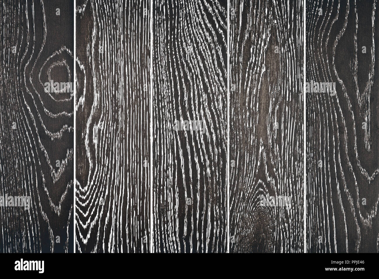 wall of black painted oak boards, background Stock Photo