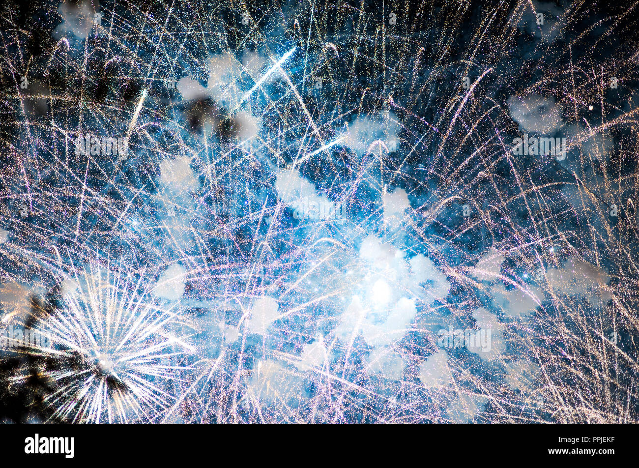 Christmas celebration neon sparkling explosion of fireworks Stock Photo