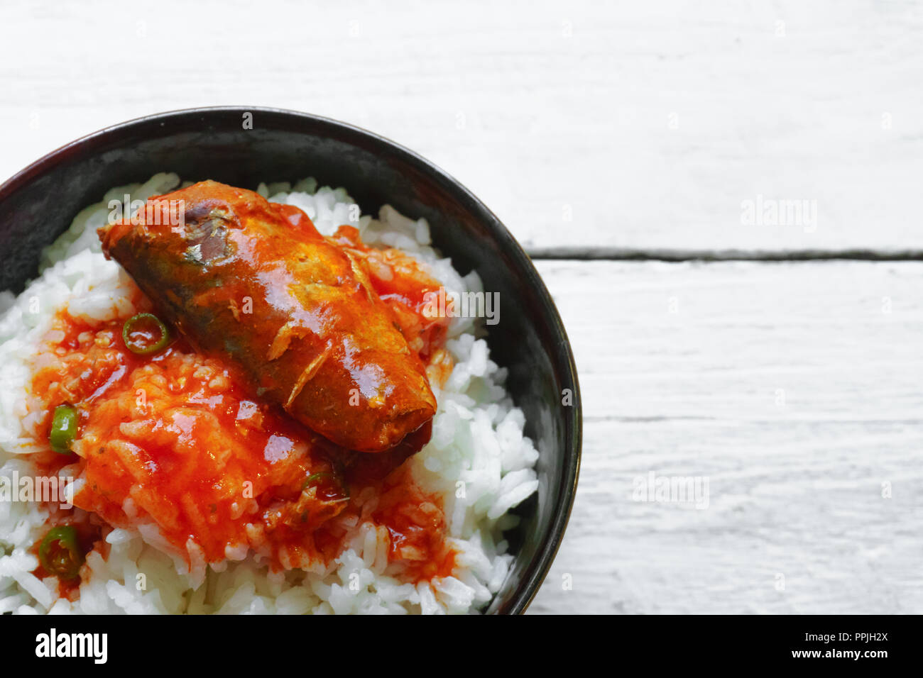 Rice with tomato sauce Top view and empty space Stock Photo - Alamy