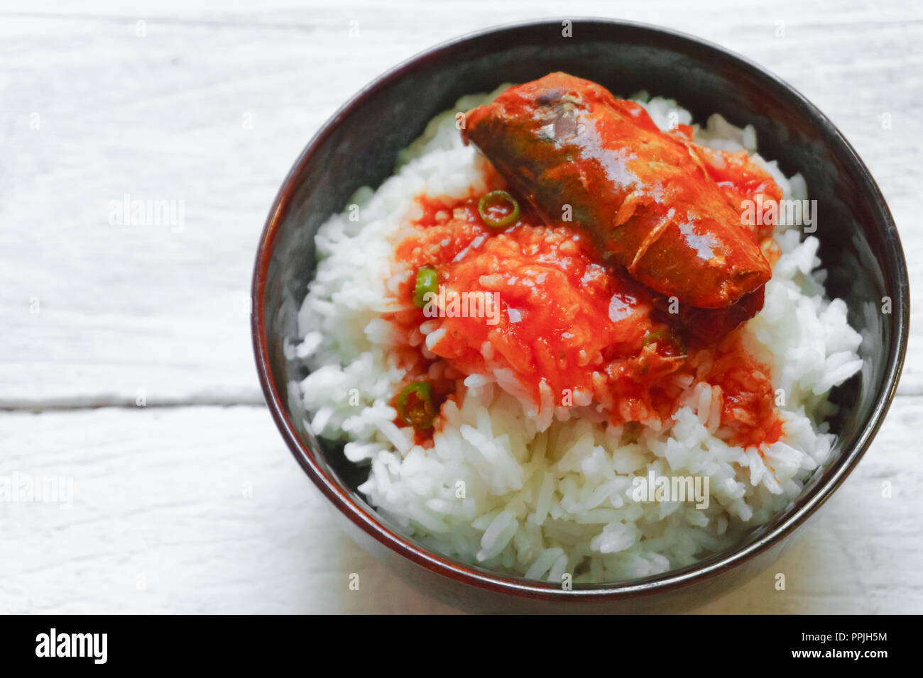 Rice with tomato sauce Top view and empty space Stock Photo - Alamy