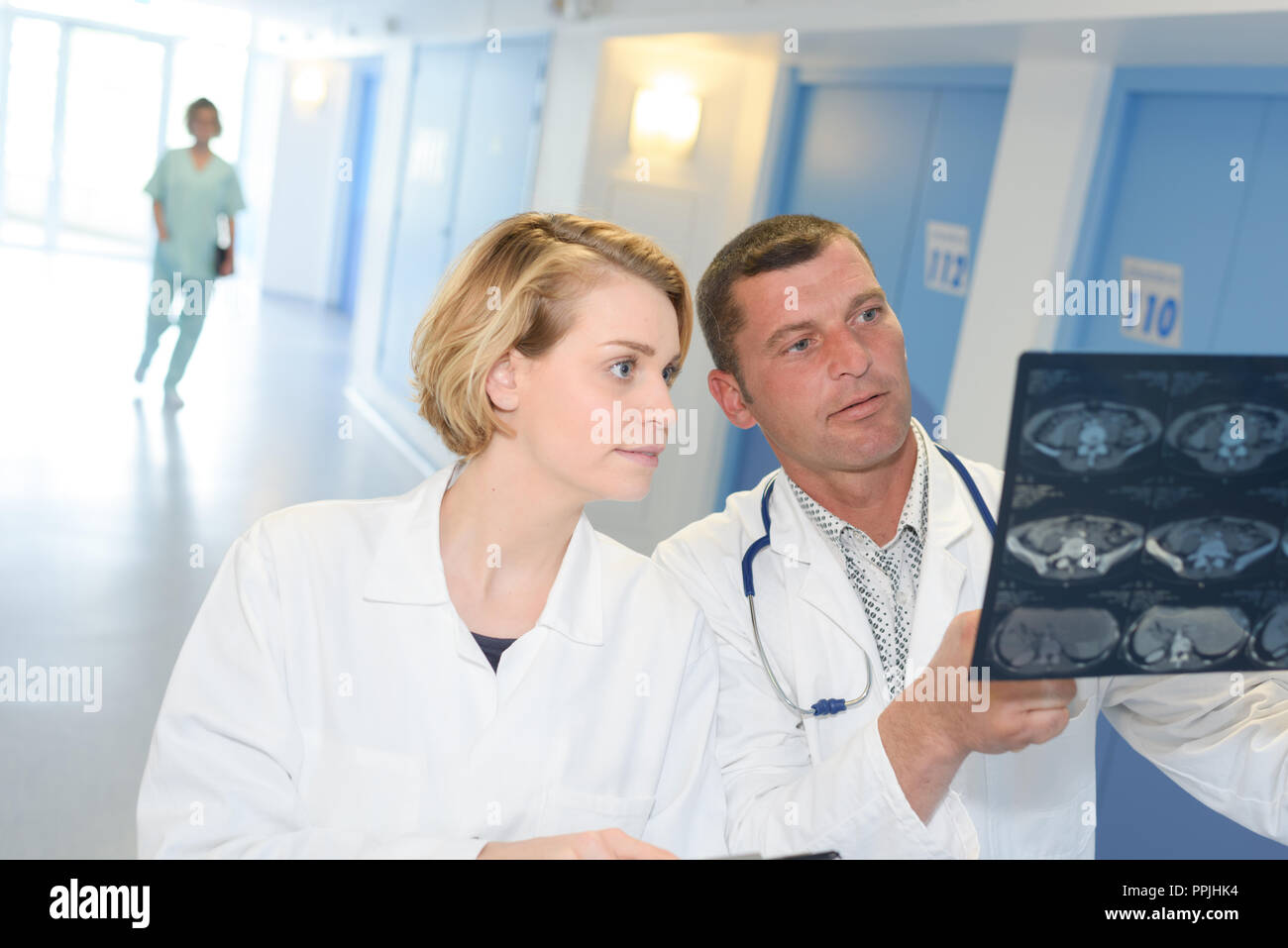 Medical team looking xray in hi-res stock photography and images - Alamy
