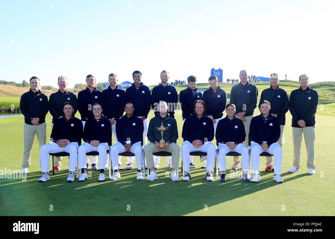 A Team USA group photo. Back Row (left-right): Zach Johnson, David Duval, Brooks Koepka, Bryson Dechambeau, Webb Simpson, Tony Finau, Dustin Johnson, Bubba Watson, Jordan Spieth, Patrick Reed, Matt Kuchar, David Love and Steve Stricker. Front Row (left-right): Justin Thomas, Tiger Woods, Jim Furyk, Phil Mickelson and Rickie Fowler during preview day three of the Ryder Cup at Le Golf National, Saint-Quentin-en-Yvelines, Paris. Stock Photo