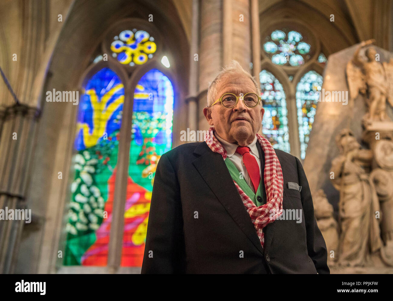 David Hockney in front of The Queen's Window, a new stained glass window at Westminster Abbey he designed and which was created by Barley Studio York, is revealed for the first time. Stock Photo