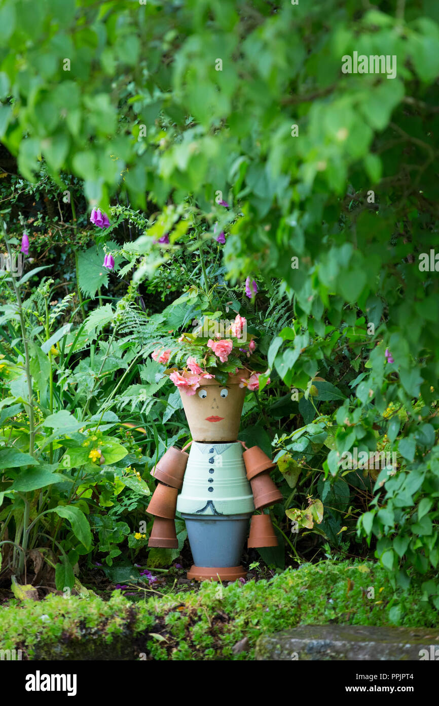 Flower pot man made from terracotta pots. Stock Photo