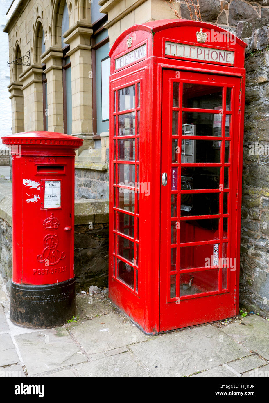 Traditional Red Telephone and Postal Boxes, together, Conwy North Wales UK Stock Photo