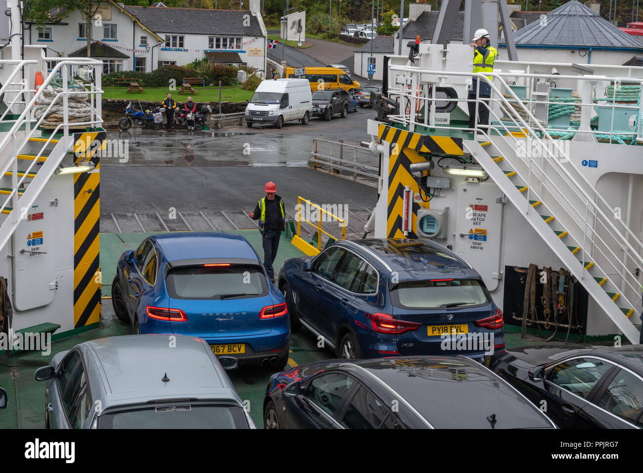 The MV Finlaggan landing at Port Askaig on Islay Scxotland Stock Photo