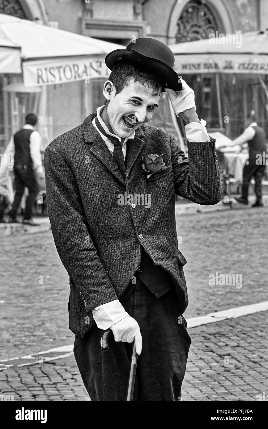 Italy, Rome, March 8/ 2018, Mime dressed as Charlie Chaplin in Piazza Navona (Navona Square) Stock Photo