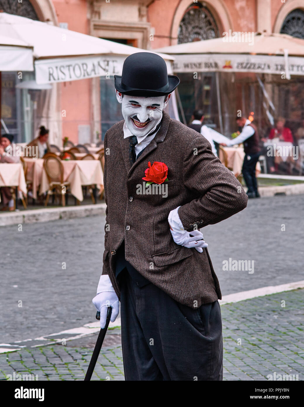 Italy, Rome, March 8/ 2018, Mime dressed as Charlie Chaplin in Piazza Navona (Navona Square) Stock Photo
