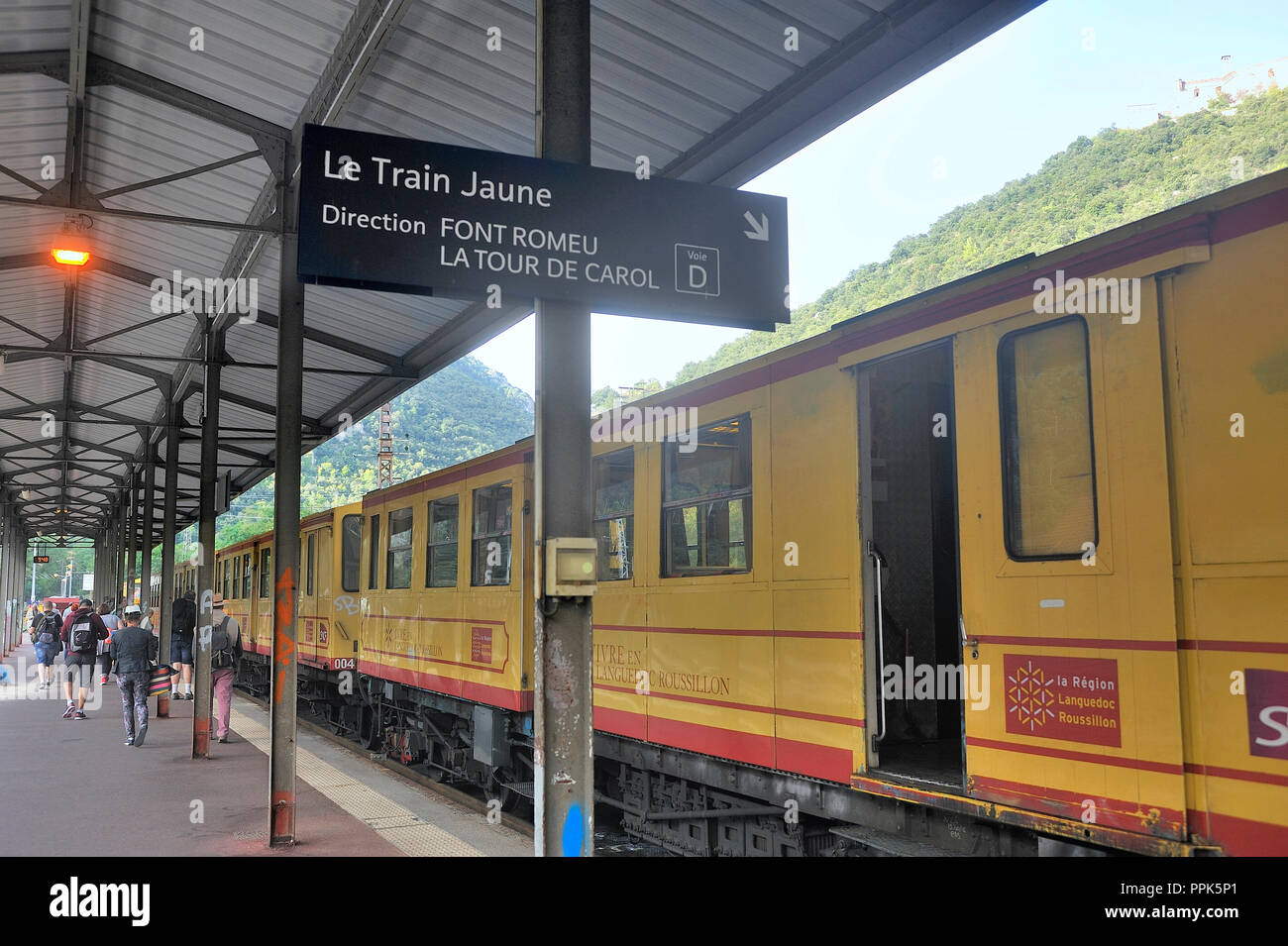 The yellow train of the Pyrenees in Villefranche station before departure for Latour de Carol Stock Photo