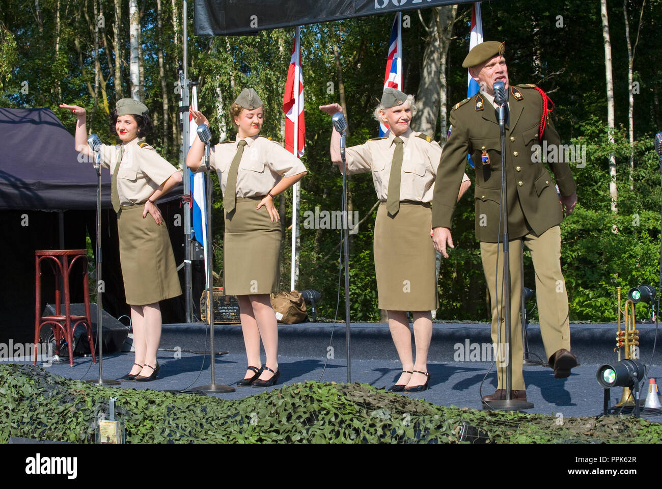 ENSCHEDE, THE NETHERLANDS - 01 SEPT, 2018: 'Sgt. Wilson's army show 'doing their stage act with historic forties songs during a military army show. Stock Photo