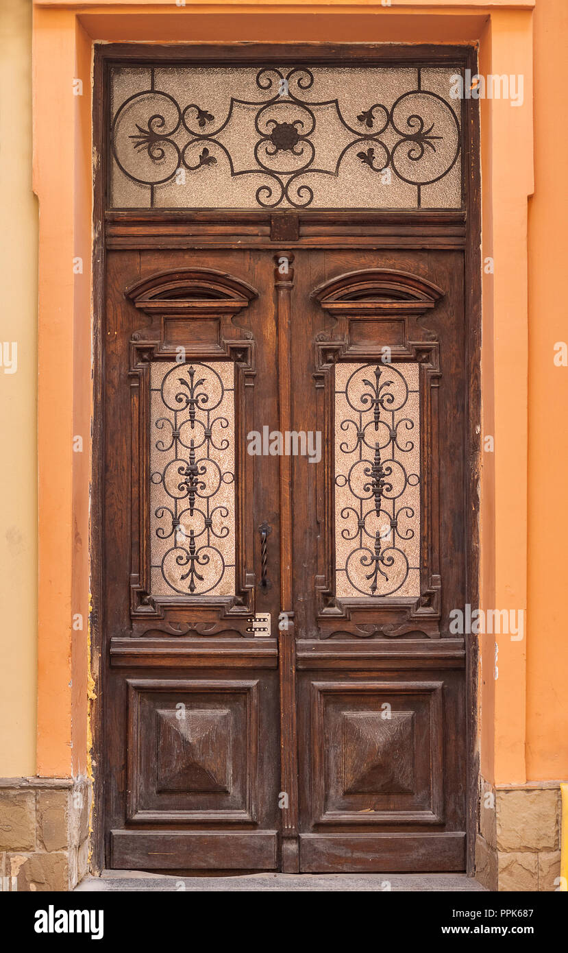 The door of the old European building. Exterior design element of