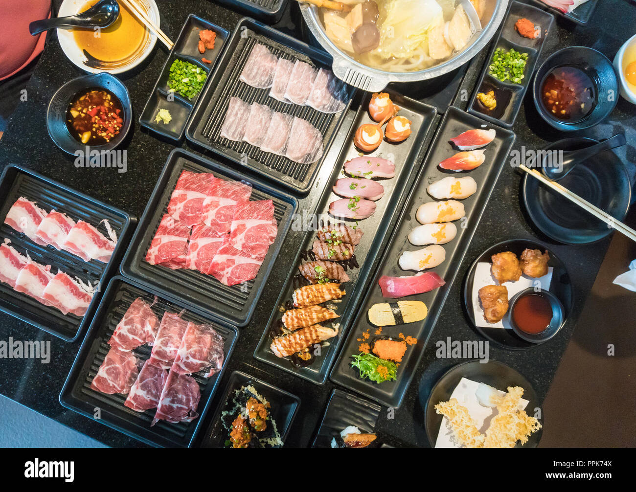 Close up set of japanese food shabu shabu sushi on table Stock