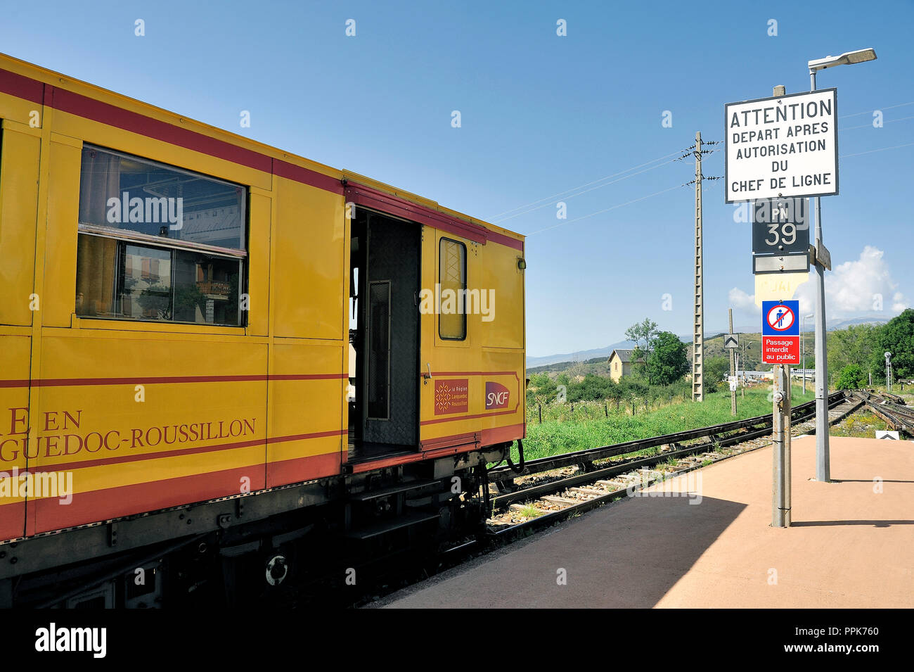 The little yellow train of the Pyrenees waiting for the departure in ...
