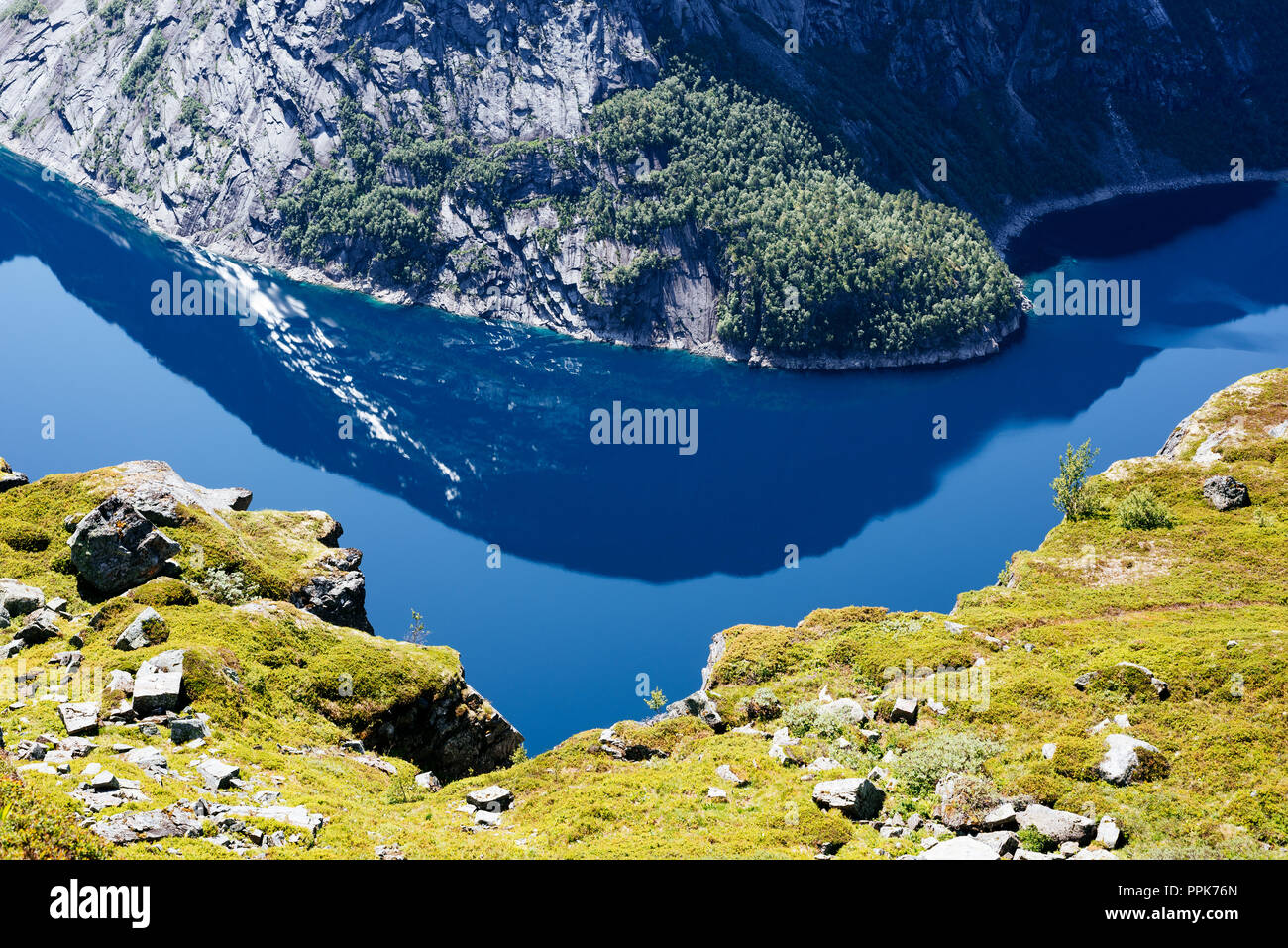 Blue lake Ringedalsvatnet. View from Trolltunga trail. Scenic landscape of Norway. Sunny weather Stock Photo