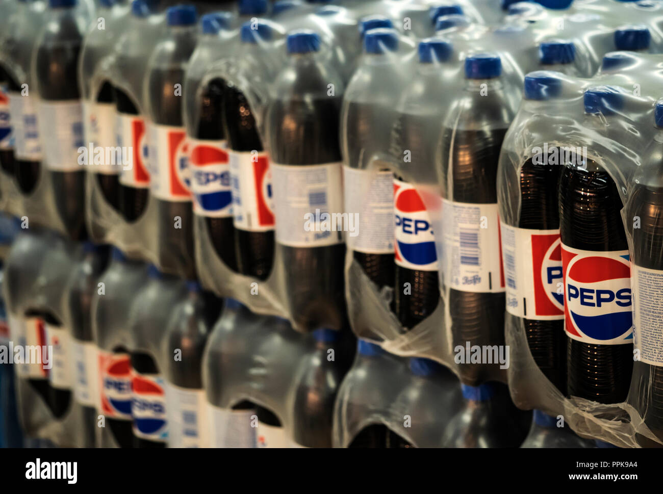 Close up a Pepsi drinks in the bottle in the supermarket shelf. Pepsi