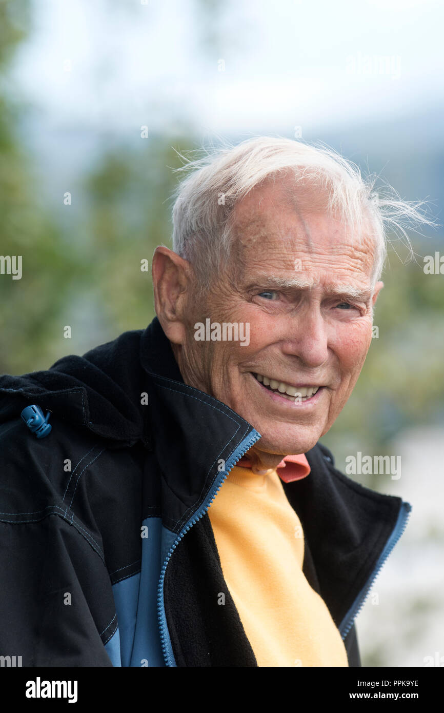 Elderly man on vacation in Alaska and posing Stock Photo