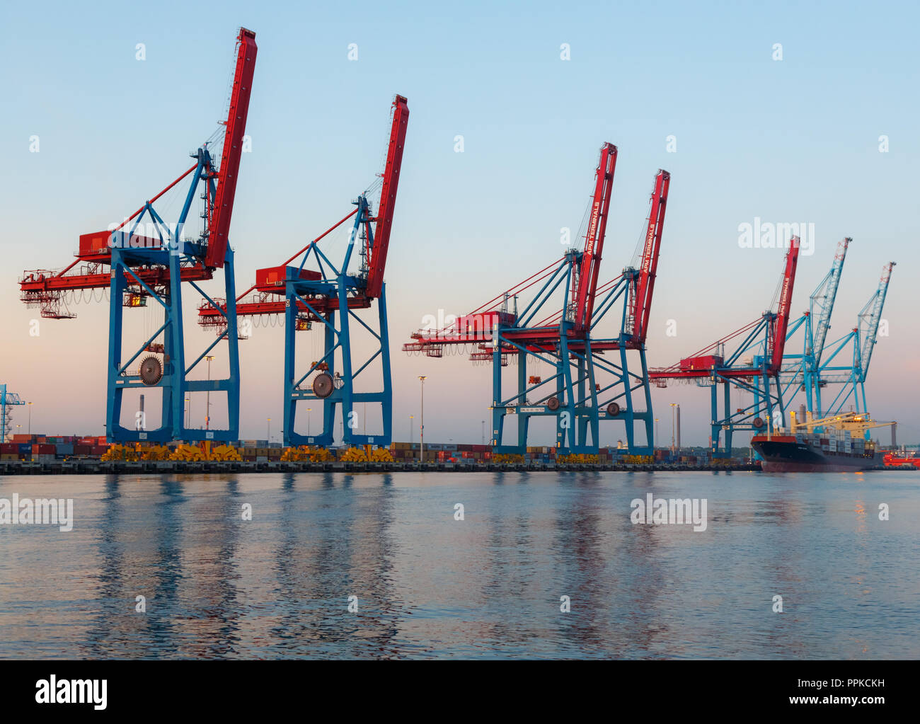 Container cranes from sea Stock Photo