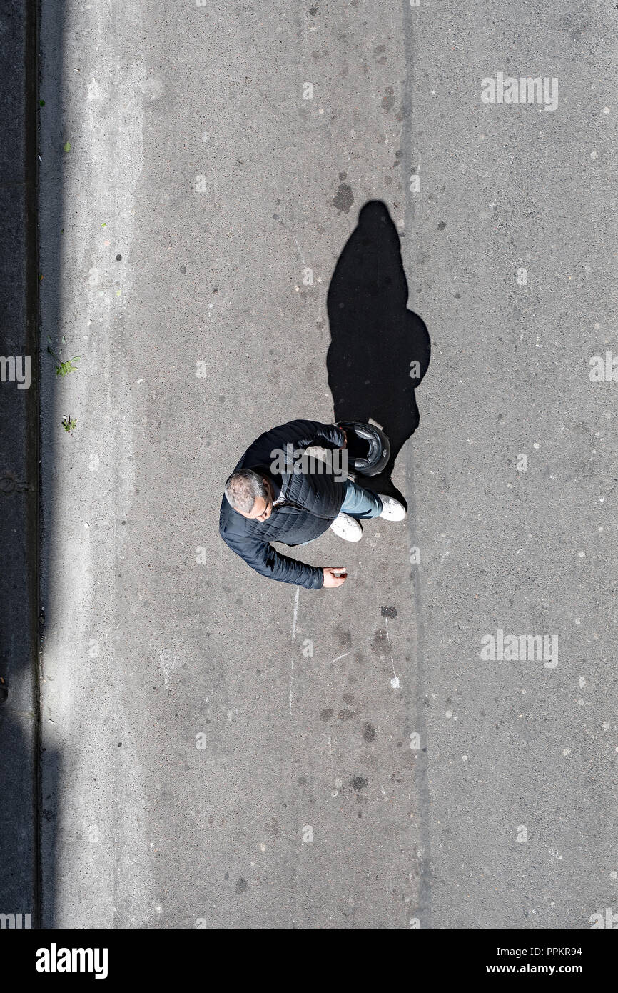 Man walking aerial street hi-res stock photography and images - Alamy