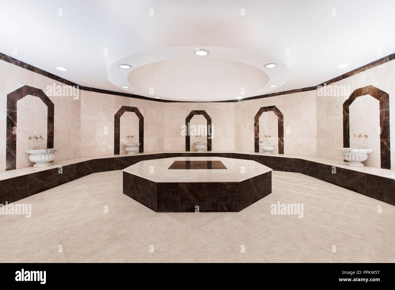 Hammam Turkish bath, steam room with hot stones, background, taps Stock