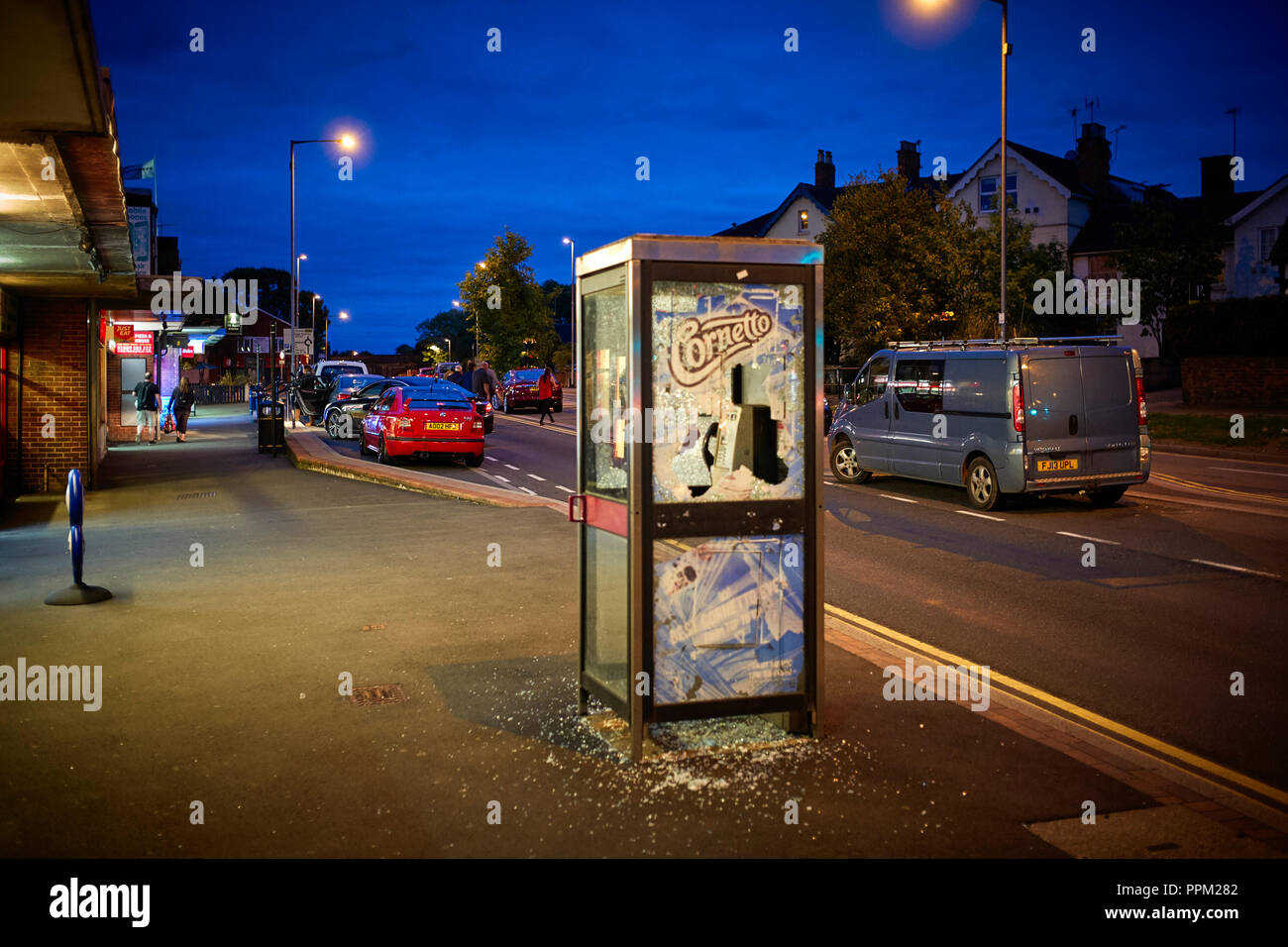 Smashed phonebox at night in Rugeley, Staffordshire Stock Photo