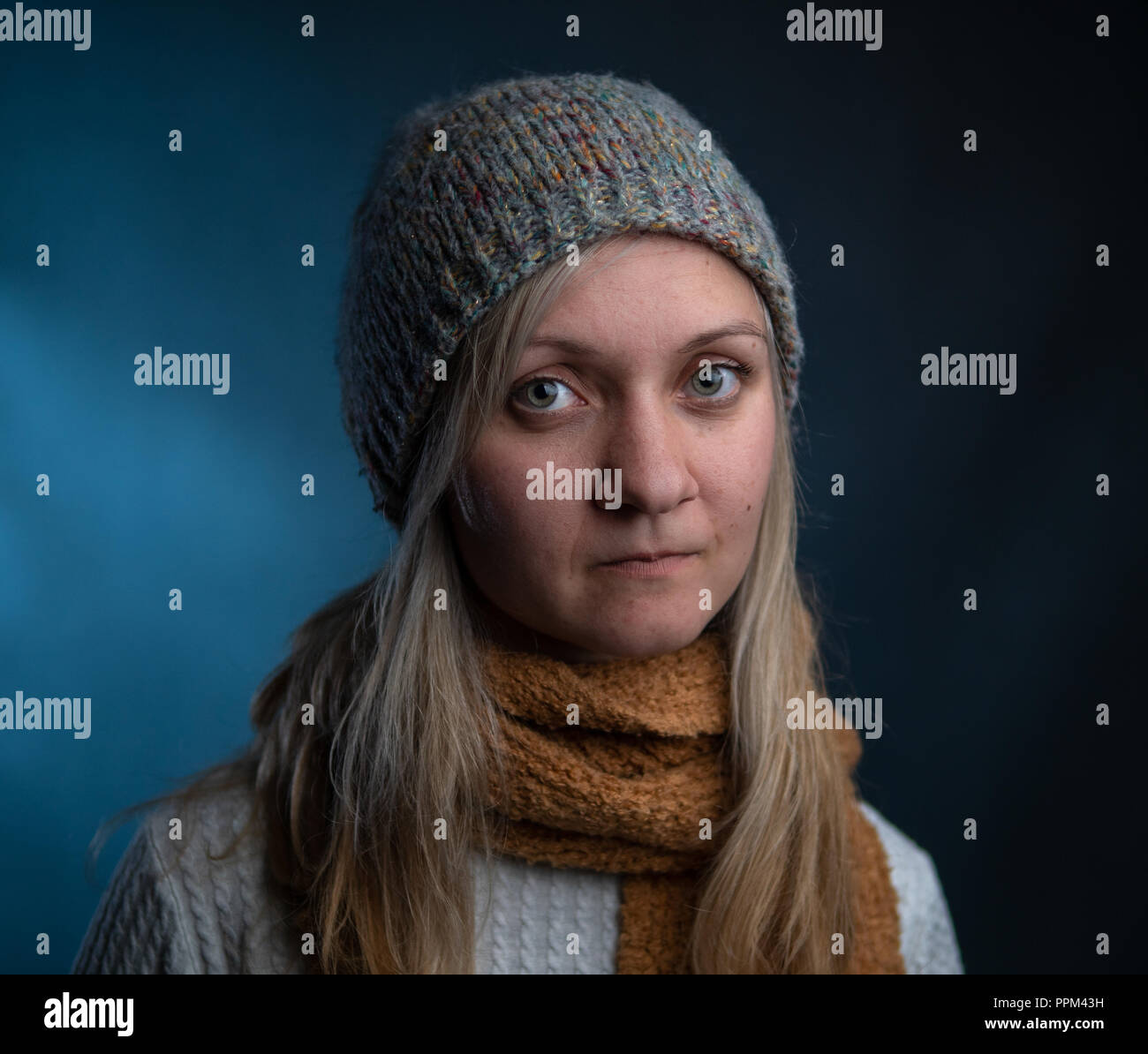 Naturally beautiful millennial woman in winter clothes Stock Photo