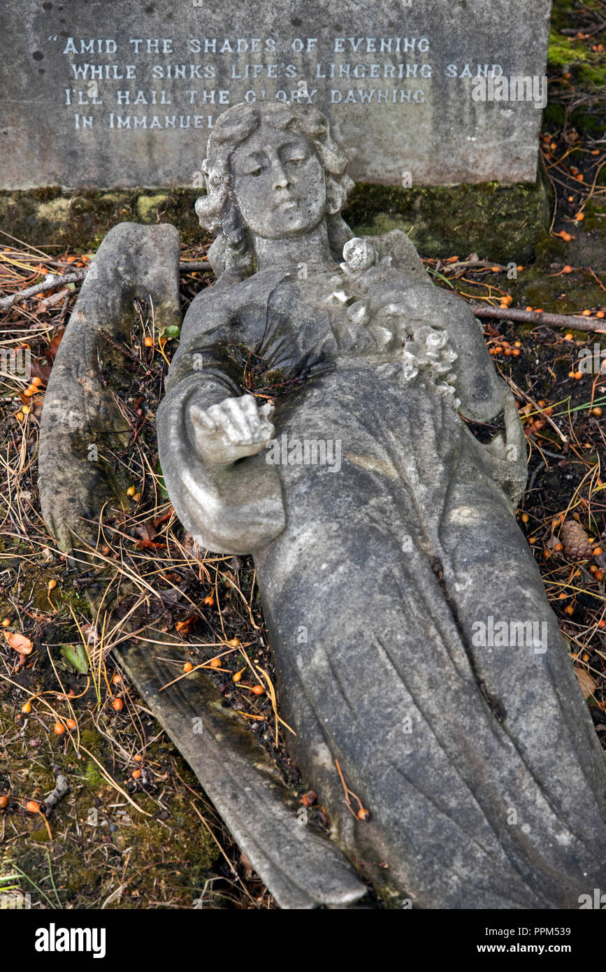 The fallen figure of an angel in Warriston Cemetery, Edinburgh, Scotland, UK. Stock Photo
