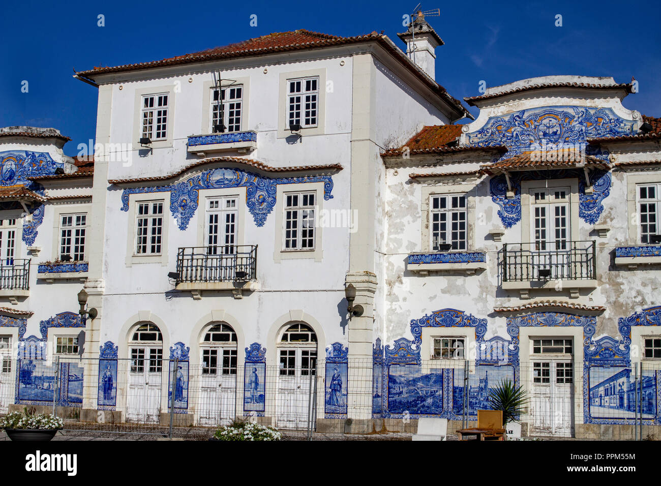 Aveiro, Portugal. The old train station in Aveiro ,decorated with  azulejo tiles depicting life in the city in the last century. Stock Photo