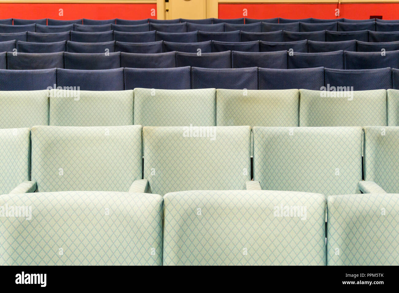Rows of empty cinema or theatre seats. Stock Photo