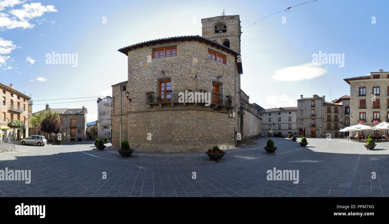 The bell tower and the back side of the stone made Saint Peter's Collegiate (Colegiata de San Pedro) in Boltaña, a small rural village in the Spain Stock Photo