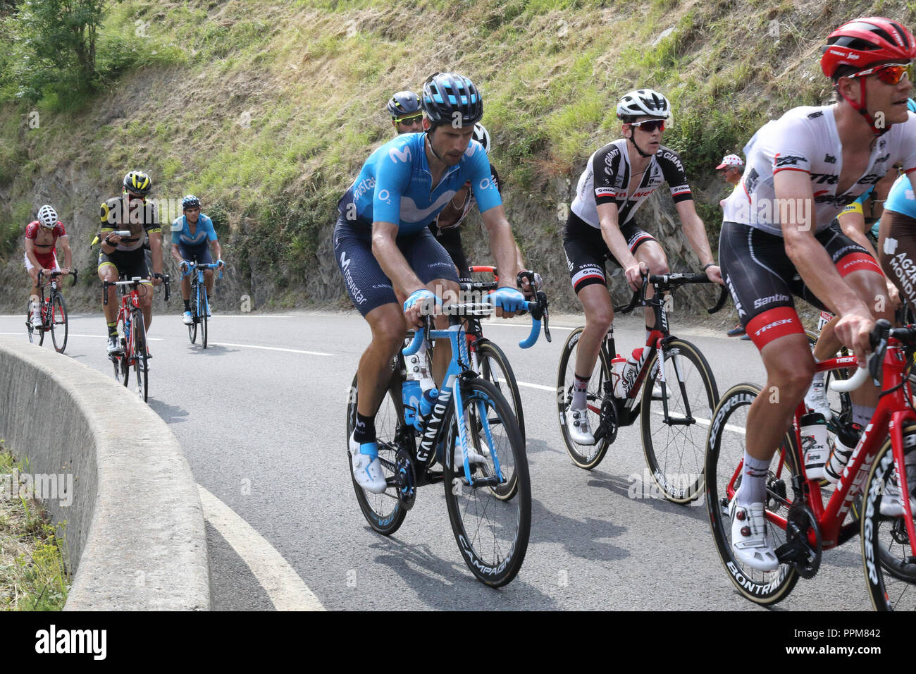 Daniele Bennati and other cyclists climbing during the 2018 Tour de France 17th stage in Soulan, in the French Pyrenees. Stock Photo