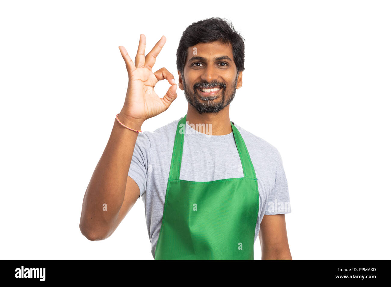 Positive concept with indian supermarket or hypermarket employee making ...