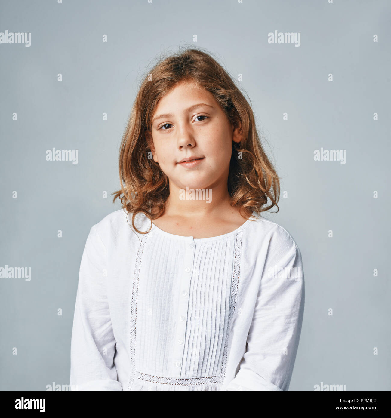studio portrait of a happy young girl Stock Photo - Alamy