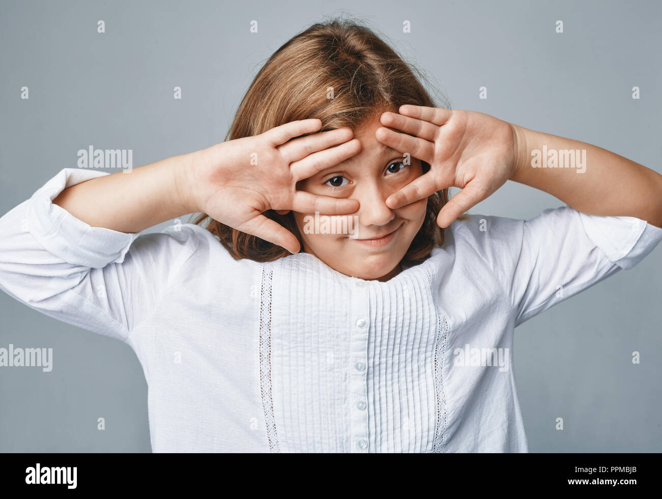 studio portrait of a happy young girl Stock Photo - Alamy