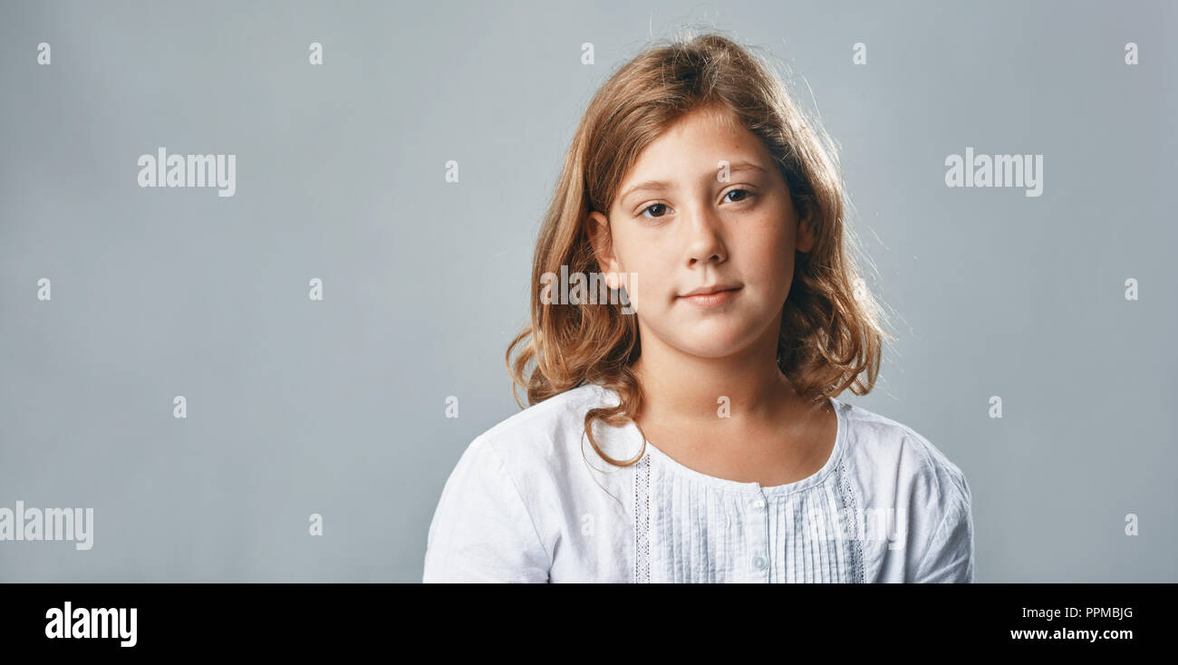studio portrait of a happy young girl Stock Photo - Alamy