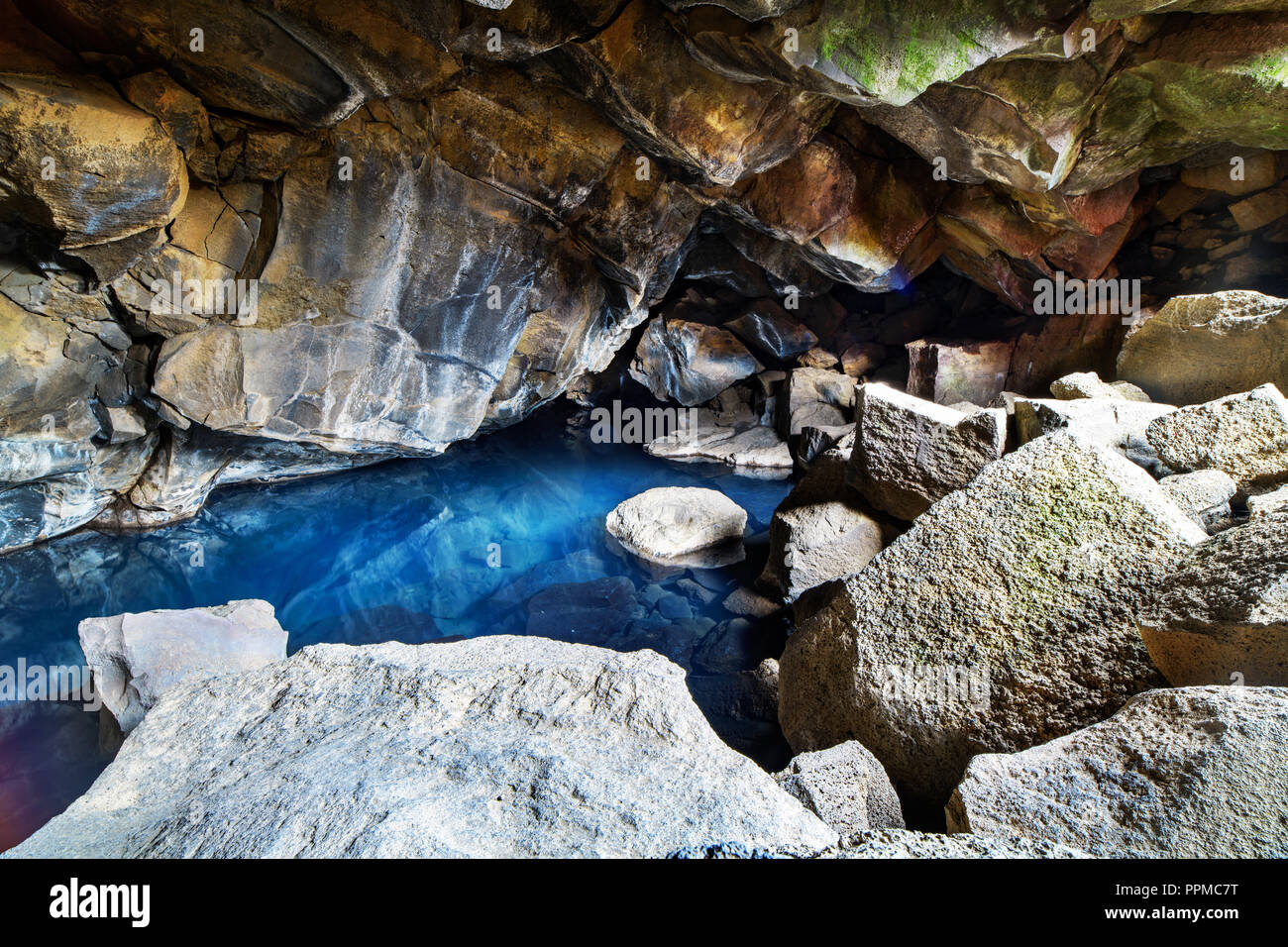 A cave filled with hot water in Iceland. Stock Photo