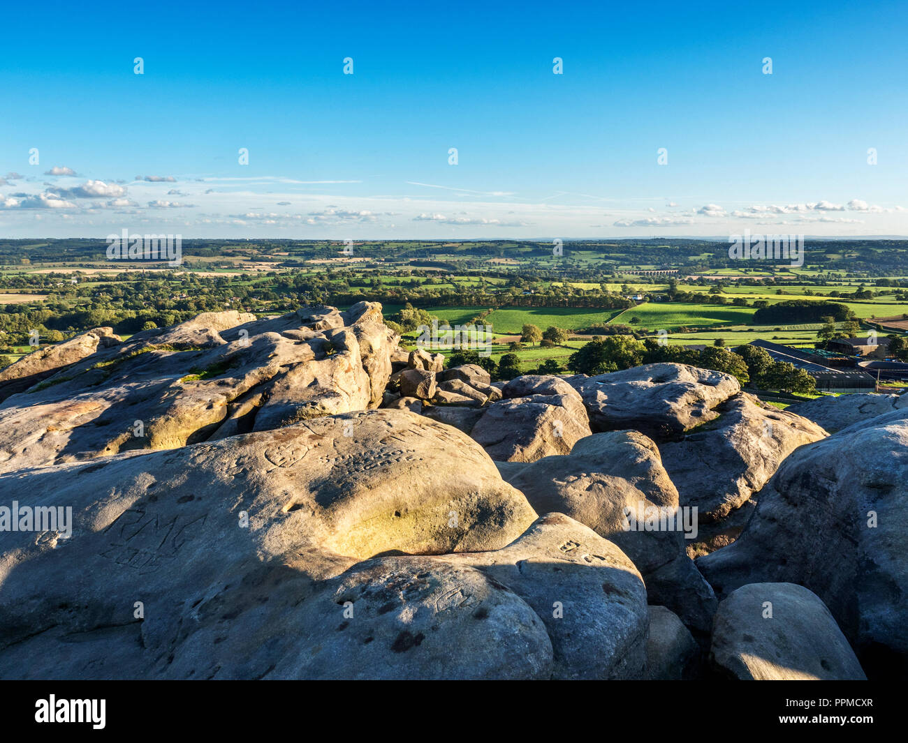 Lower Wharfe Valley from Almscliff Crag millstone grit outcrop near Harrogate North Yorkshire England Stock Photo